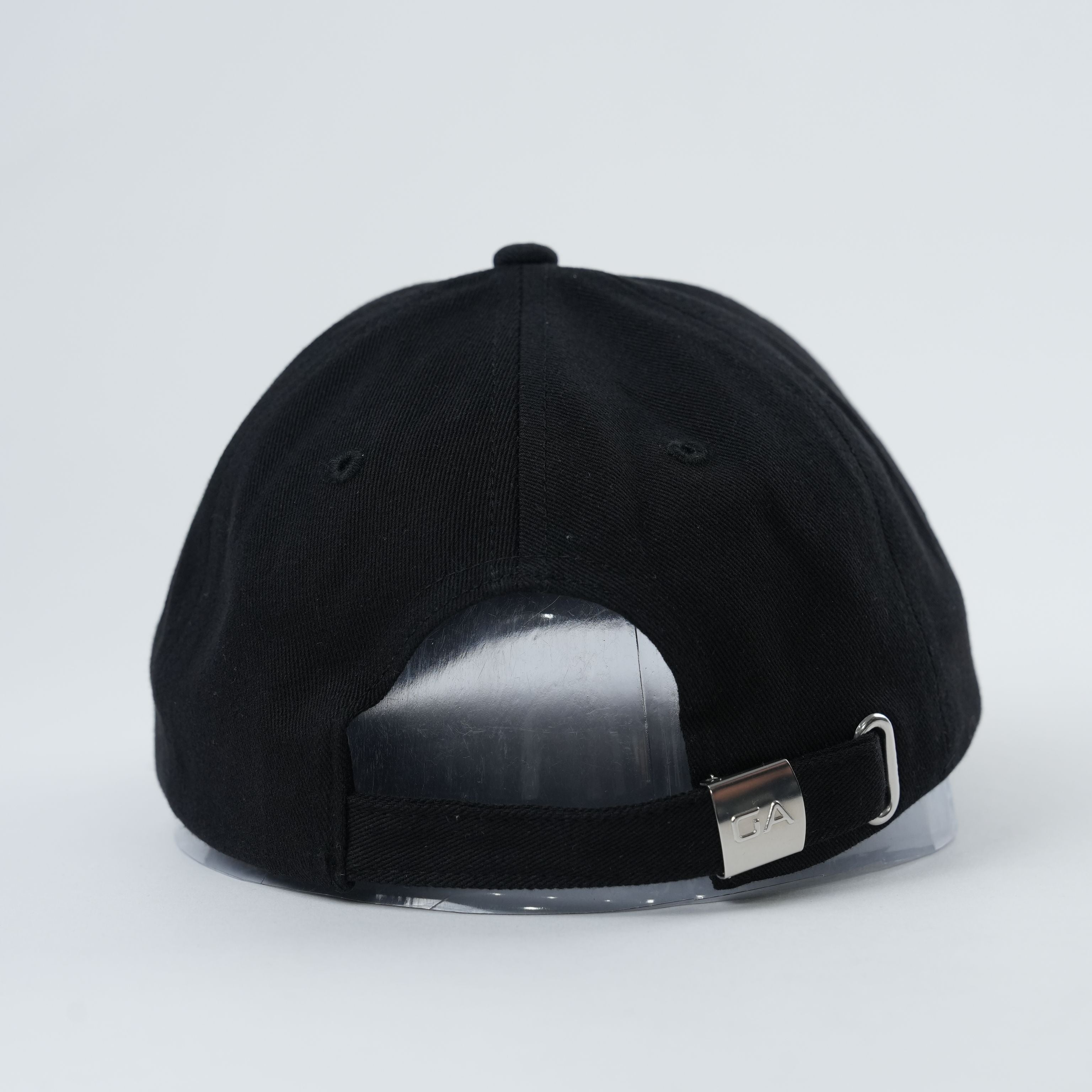Back view of the Gymathlete Peak Organic Cap showcasing the adjustable strap and minimalist design, ideal for sustainable and active lifestyles.