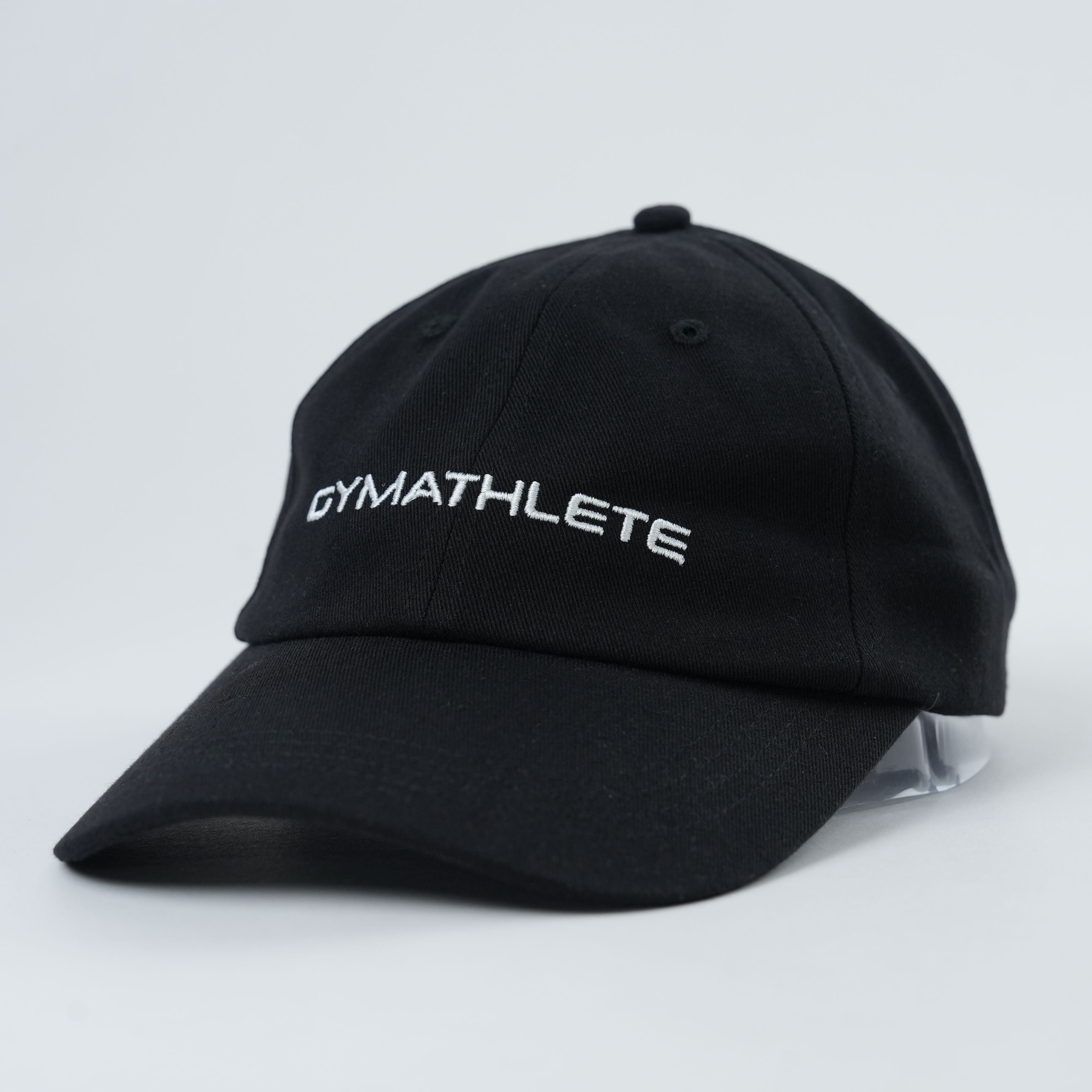 Gymathlete Peak Organic Cap in black, showcasing a sleek and minimalist design with an embroidered Gymathlete logo, perfect for everyday wear and performance.