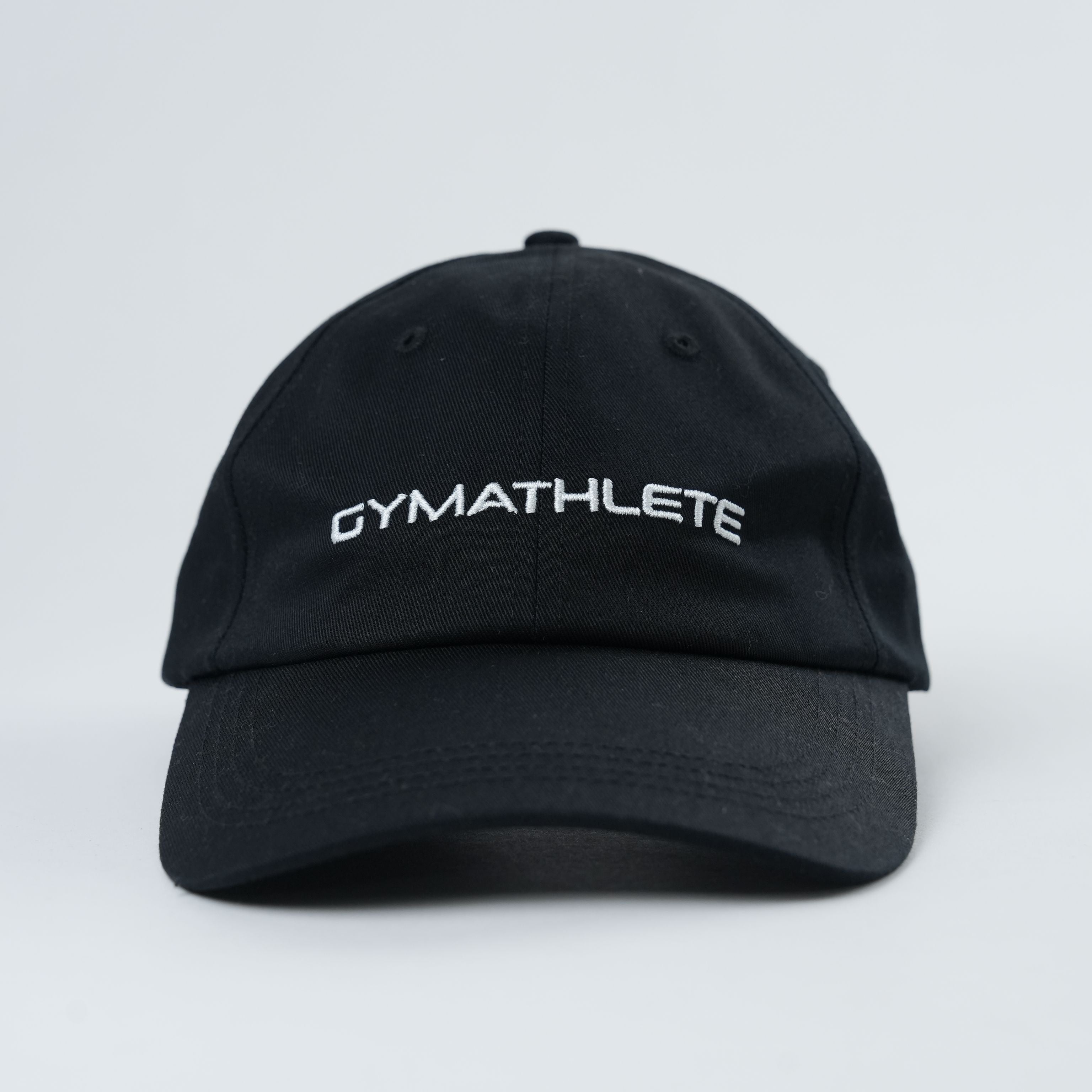 Front view of the Gymathlete Peak Organic Cap in black, featuring the embroidered Gymathlete logo, designed for style and performance.