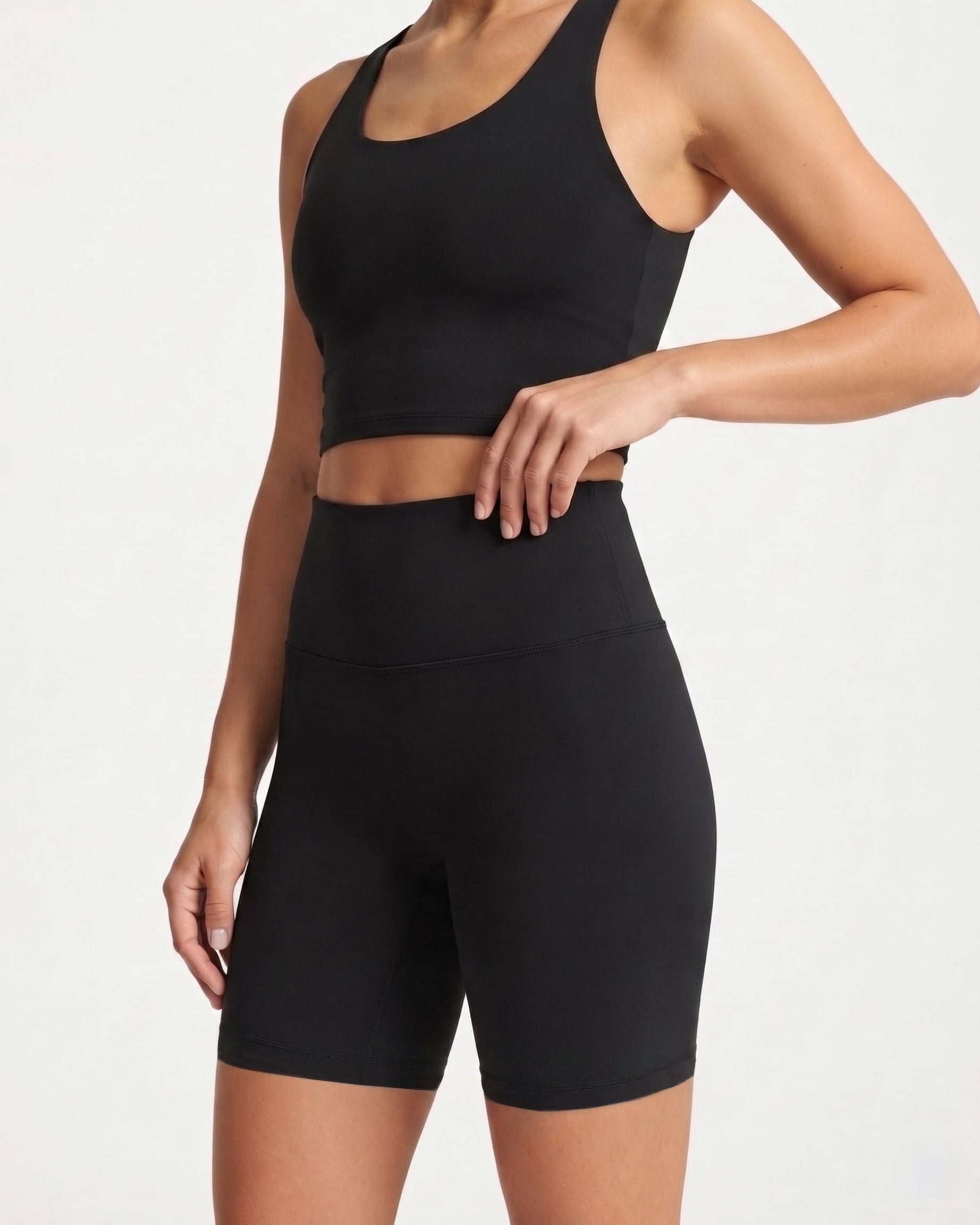 Black Gymathlete Pulse high-waisted biker shorts, close view showing waistband and fit